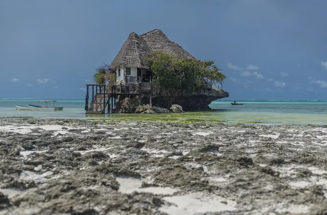 The Rock restaurant on its coral outcrop at low tide